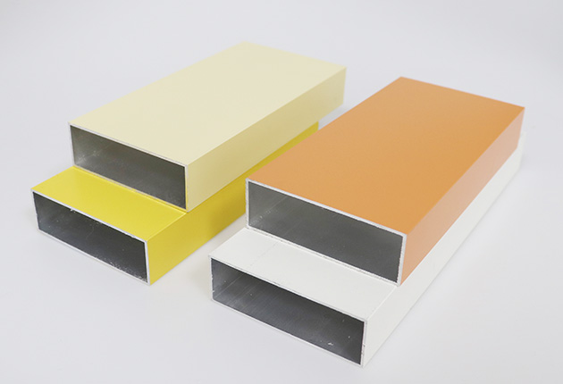 Orange powder-coated rectangular aluminum profile